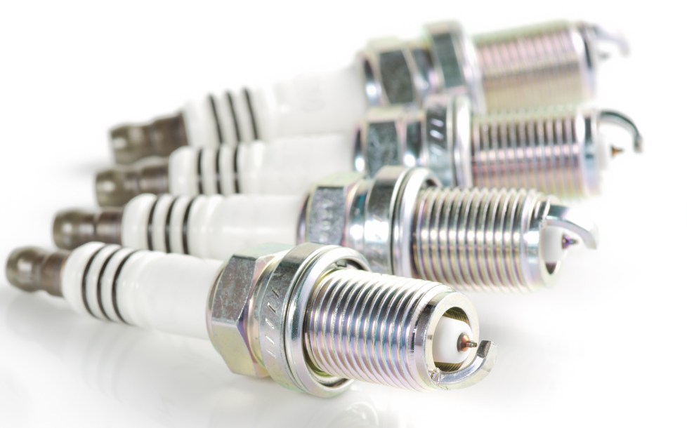 Spark plugs made with iridium